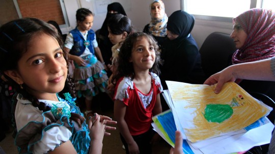 "Refugee children from Syria at a clinic in Ramtha, northern Jordan (9613477263)" by DFID - UK Department for International Development - Refugee children from Syria at a clinic in Ramtha, northern JordanUploaded by russavia. Licensed under Creative Commons Attribution 2.0 via Wikimedia Commons - https://commons.wikimedia.org/wiki/File:Refugee_children_from_Syria_at_a_clinic_in_Ramtha,_northern_Jordan_(9613477263).jpg